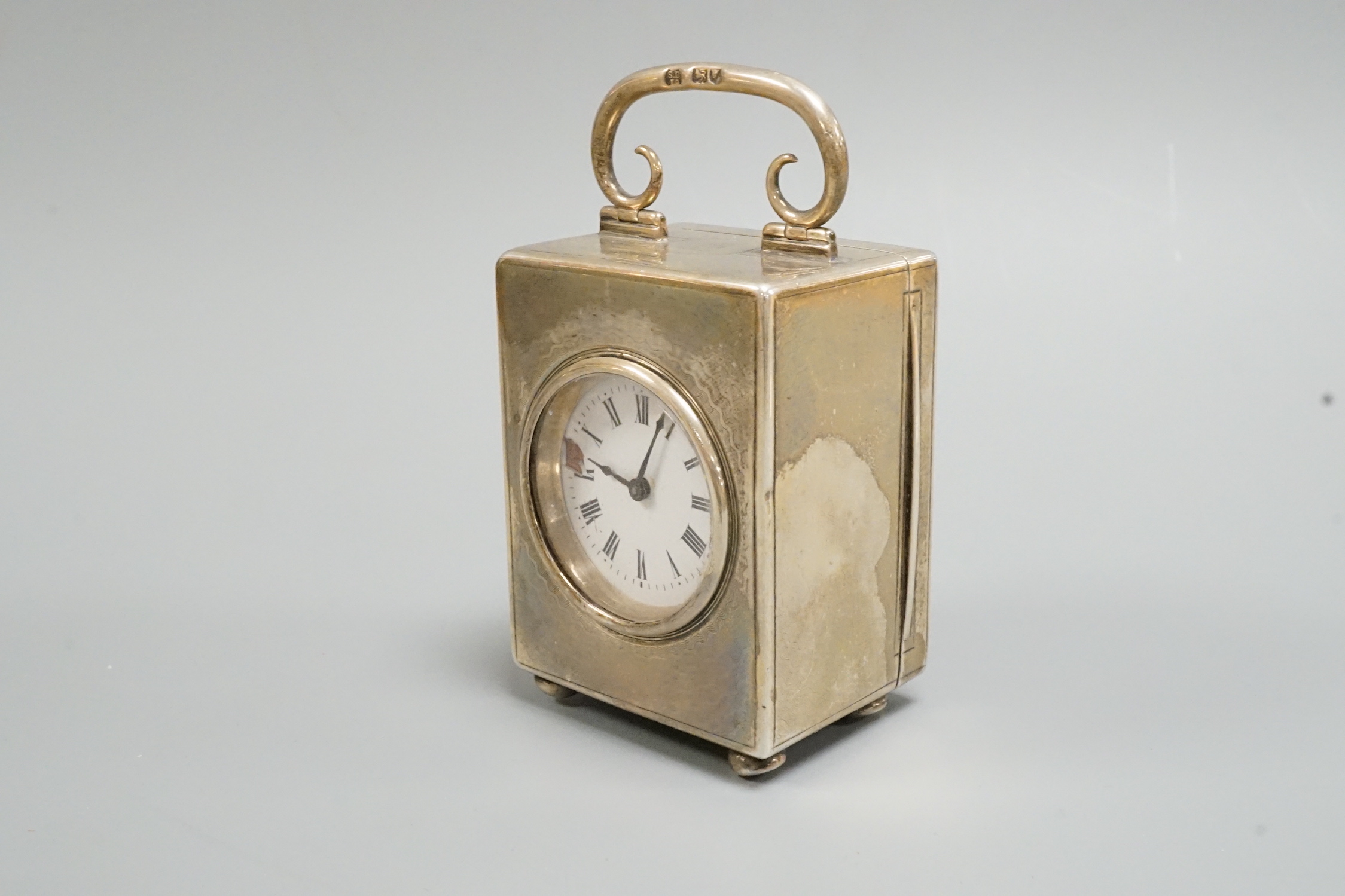 An Edwardian silver cased miniature carriage timepiece, Stewart Dawson & Co Ltd, London, 1909, height 73mm (dial a.f.).